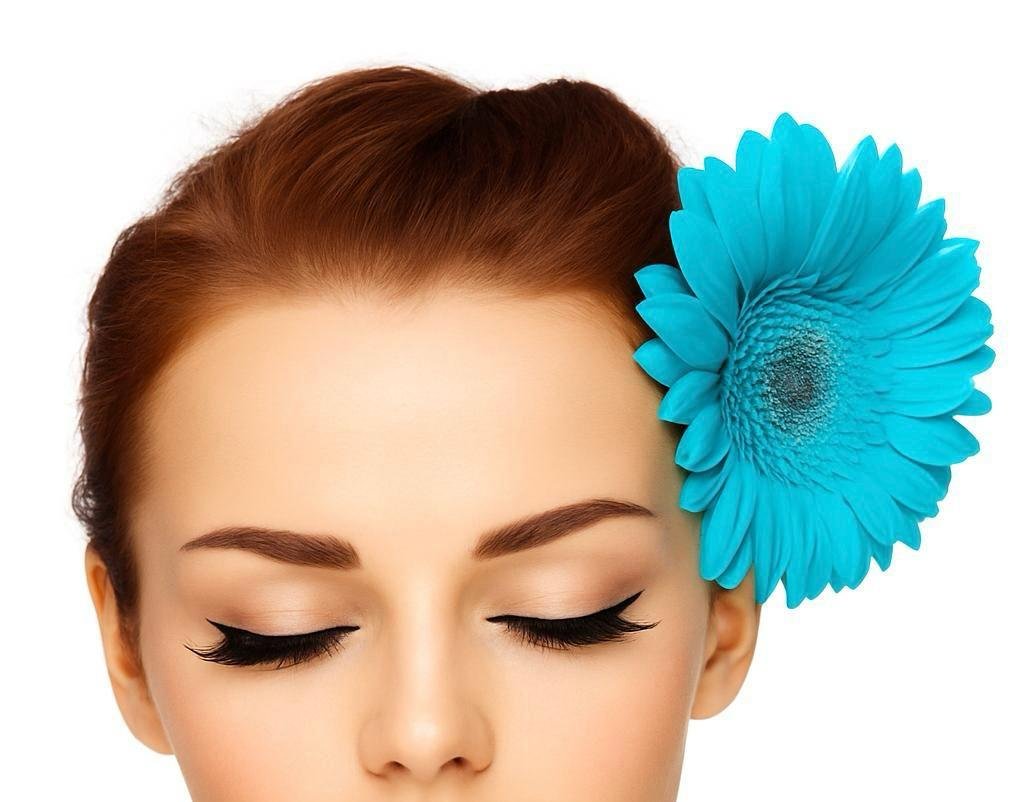 Woman with elegant lashes and turquoise flower, Lash & Beauty Spa hero image